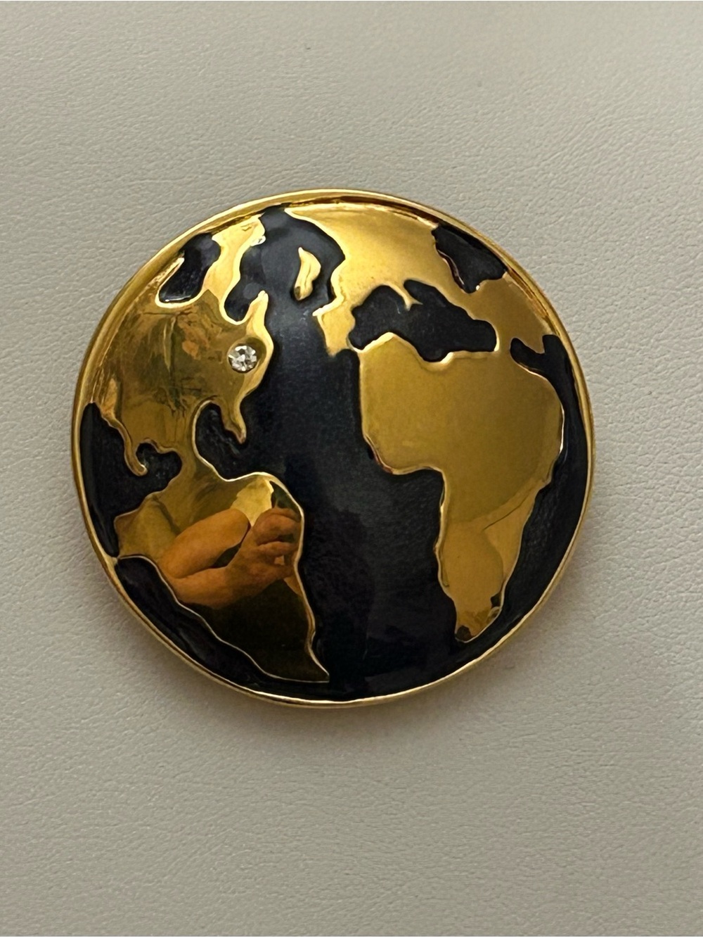 Vintage Monet 1980s 1990s goldtone & black enamel world map / globe pin / brooch